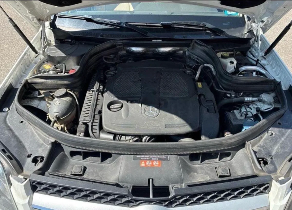 Engine bay of a Mercedes-Benz GLK with the hood open